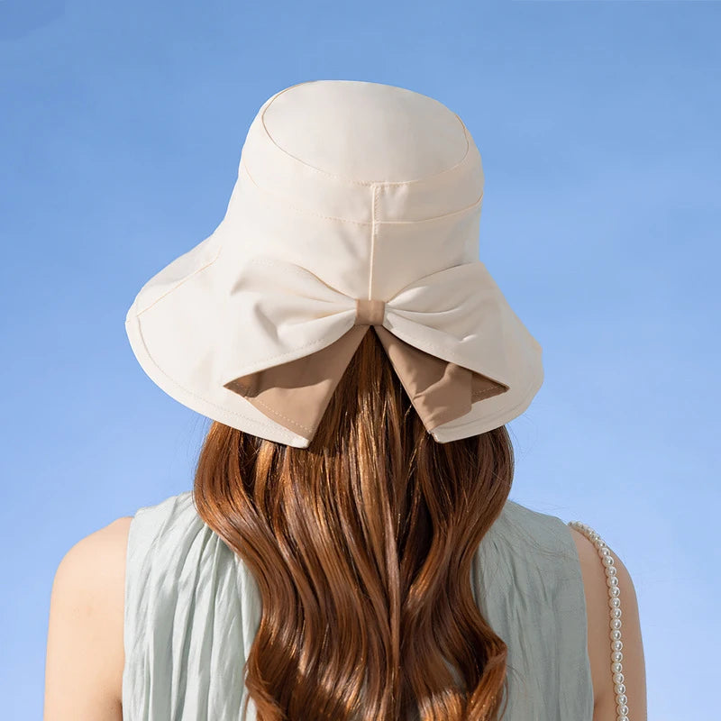 Vrouwen zomerzon bescherming emmer hoed met boog-tie dame elegante zonnebrandweergreep buiten brede rand headdear groothandel nieuw in