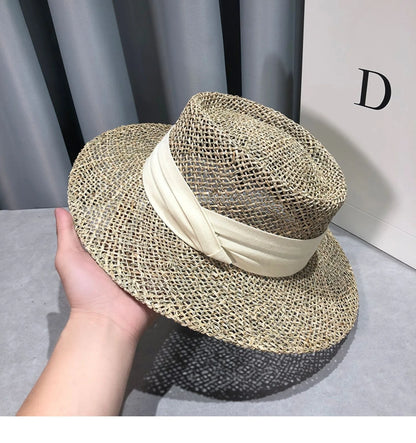 Gratë e Modës Verore Sunshade Sunshade Kapele të gjera Fradora për Udhëtimi Beach Beach Casual Hollow Out Simple Fedora Straw Hats